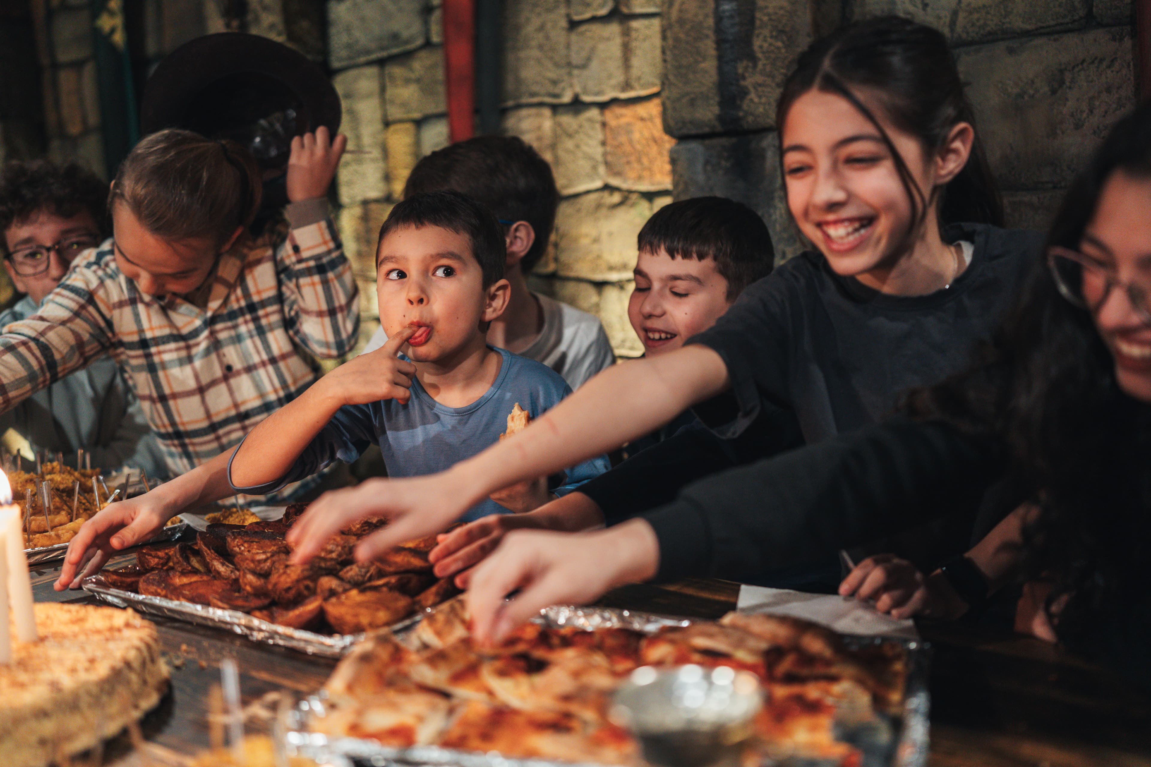 A birthday group sharing food after the adventure