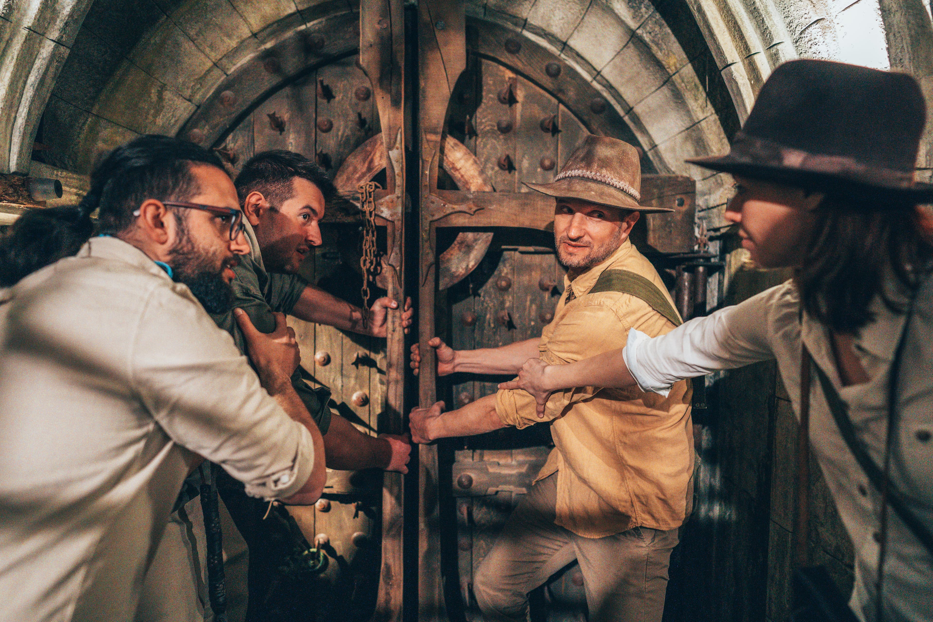 A team solving a shared challenge in an adventure setting